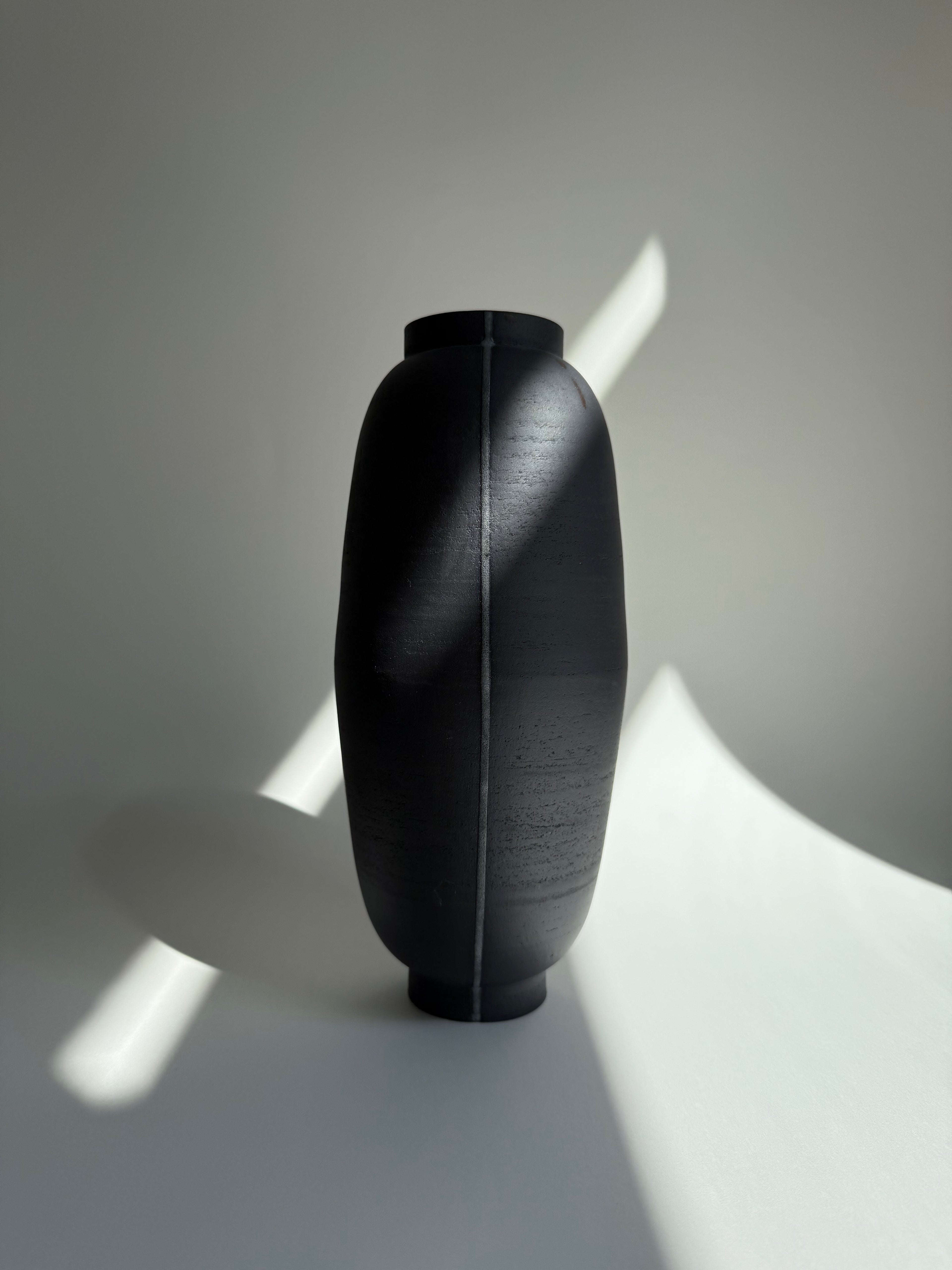 Black Vase with one graphic line